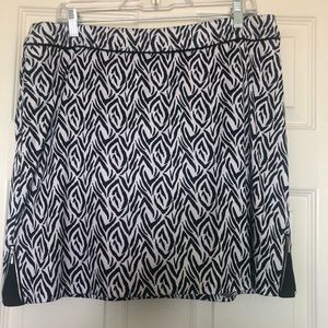 Greg Norman pull on zebra skort